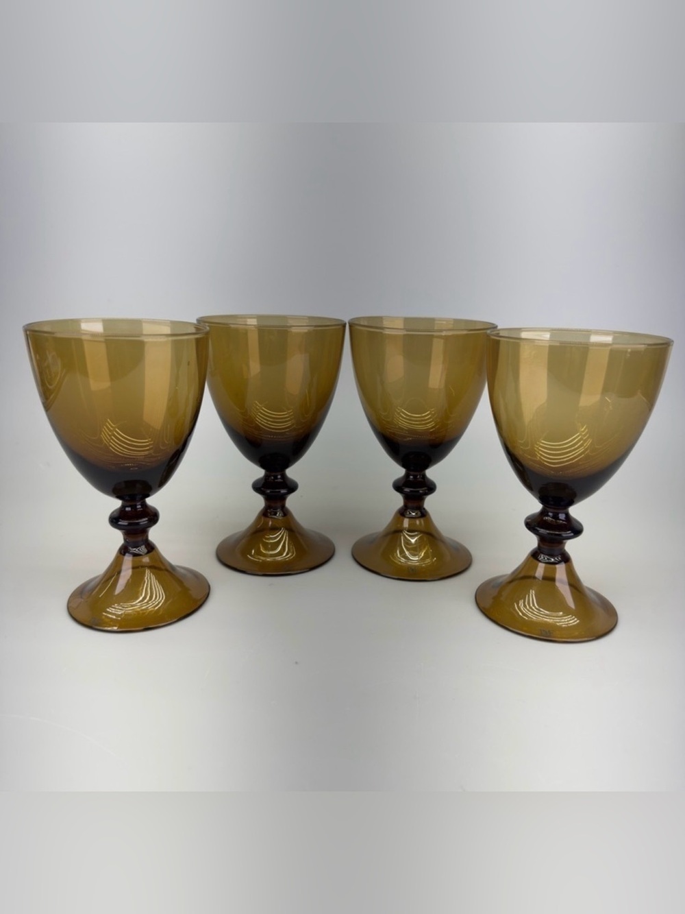 Set of 4 Diane Von Furstenberg 
Handblown Amber Wine Glasses